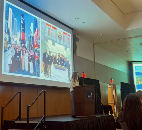 A family poses for a photo together on Move-in Day
